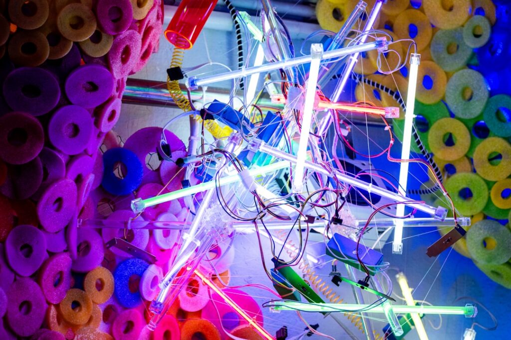 Close-up shot of a messy, tangled bundle of colorful computer cables and wires, representing digital chaos and a fragmente...