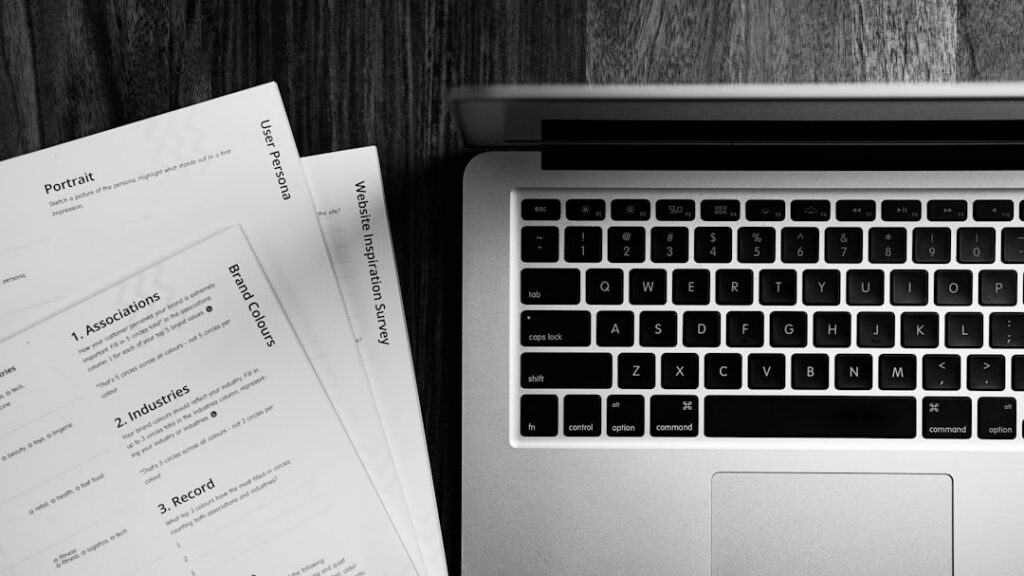 Crumpled piece of paper, representing an obsolete report, sits on a clean desk next to a sleek, modern laptop, symbolizing...