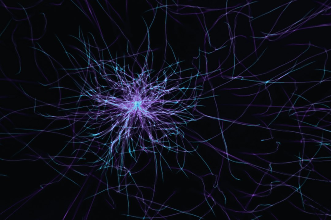 An abstract digital visualization of a glowing blue neural network on a dark background, representing artificial intelligence and data connections.